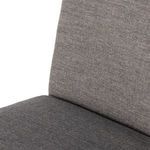Close-up on upper backrest upholstery showing fabric weave and stitching on Abida Alcala Nickel Dining Chair