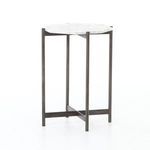 Side angle showing clean lines of aluminum legs and octagonal marble tabletop