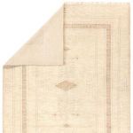 Rug corner flipped to display the reverse side weave and edge detail