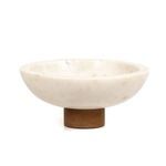 Side profile of white marble bowl emphasizing depth and wood pedestal base