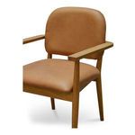 Three-quarter front view of Norrie dining chair emphasizing cushioned seat and armrests