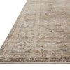 Close-up of rug edge showing flat woven construction and subtle color shifts