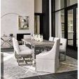 Townsend Arm Chair in modern dining room with polished table, decorative candles, and black floor tiles
