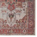 Detailed close-up of central medallion and floral border highlighting color gradations