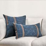 Blue square pillow paired with coordinating rectangular lumbar pillow on white sofa