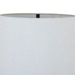 Top edge of white drum lamp shade showing inner metal frame