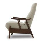 Side view of Jarvis Recliner with footrest retracted showing sleek fabric seat and sculpted wood arms