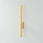 Bernard Wall Sconce side angle showcasing gold finish and backplate details on light wall