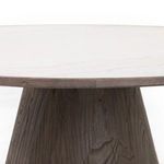 Close view of the tapered oak cone base texture and grain pattern