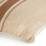 Corner close-up showing woven beige and brown stripes and fabric texture with slight puffiness