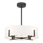 Front angled view of the fan showing the balance of fabric shade and metal frame