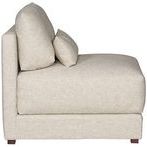 Side view showing the chair’s deep seat, thick cushions, and low-profile armless design