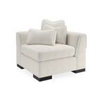 Three-quarter view of Edge Loveseat corner segment with layered cushions and textured fabric