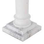 Close-up of the middle marble column showing the smooth carved details and veining