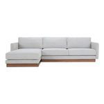 Light gray Vernon sectional sofa with wooden plinth base and reversible cushions, left-facing chaise