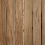 Top-down close-up showing the natural teak wood grain and spacing between slats on the table top