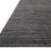 Jamie rug showing angled side view highlighting low pile and detailed hand-loomed weave texture