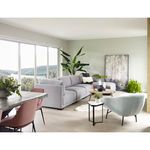 Interior room featuring Romeo Modular Sectional with grey fabric, plants, and natural light
