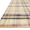 Angled edge view showing thin profile and clean cut of the rug