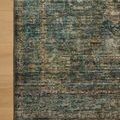 Partial top-down view highlighting detailed floral border on wood floor