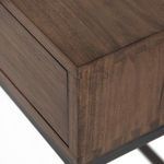 Front close-up of left drawer front with visible leather strap handle detail
