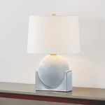 Leeston Tall Table Lamp illuminated, highlighting soft gradient on blue ceramic base