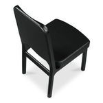 Close-up of Kerr chair corner showing vegan leather texture and wood grain legs
