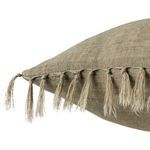 Close-up of sage linen pillow tassels showcasing knotted rustic fringe detail