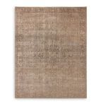 Full view of natural jute rug lying flat on white background highlighting faded vintage pattern