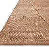 Corner close-up showing thick braided texture and edge binding of jute fibers