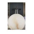 Front view of sconce with alabaster globe appearing slightly brighter and more diffused