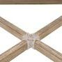 Close-up of natural wood base showing crossed footrest supports wrapped with rope detail