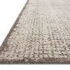 Low-angle side view showing the rug's thickness and textured edge detail