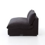 Side profile of Grant sectional showing plush seat cushion and two back cushions in deep charcoal fabric