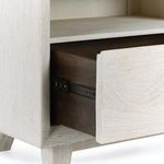 Reece Nightstand styled with gray concrete lamp and decorative items on top in bedroom setting