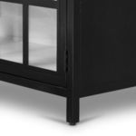 Close-up corner detail of frame with clean black finish showing hinge attachment