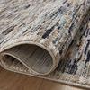 Close-up of Soho Multi Sand Rug folded to show texture and pile thickness