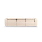 Back view of Radley sectional with visible seams on back cushions and uniform beige fabric