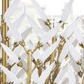 Close-up of white glass leaves attached to gold metal stems showing leaf shapes and textured finish