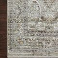 Close-up of corner on Bonney Moss / Stone Rug revealing detailed border pattern on dark wood floor