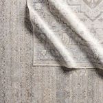 Texture detail showing rug folded back over itself emphasizing lustrous and soft fibers