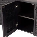 Interior shelving visible inside open cane doors with concealed metal hinges on the cabinet.