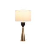 Rome Matte Table Lamp lit with warm glow from white shade against white background