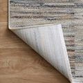 Corner flipped to reveal the woven backing of the Soho Multi / Dove Rug