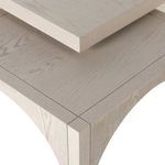 Close-up of corner detail highlighting the meeting point of tabletop edges and arch structure