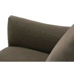 Close-up detail of curved backrest seam and slipcover contour on Noel Slip Swivel Chair