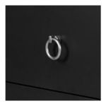 Close-up of single metal ring knock handle on smooth black drawer front