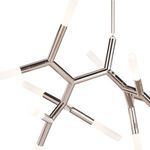 Detailed view of central branching joints and tubular arms with frosted bulbs on Traveler Chandelier Large