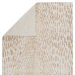 Top view with one corner flipped to reveal the lighter underside of the leopard print rug