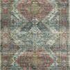 rug viewed flat with colors leaning more towards misty blue and green shades than apricot